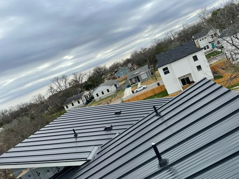 Standing seam metal roof panels with vents for Skylight Repair in Urbandale